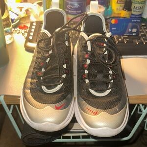 Nike Black and Silver Sneakers with Red Accents